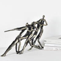 Skulptur - in Bronzeoptik - Metallskulptur Deko-Objekt Tauziehen
