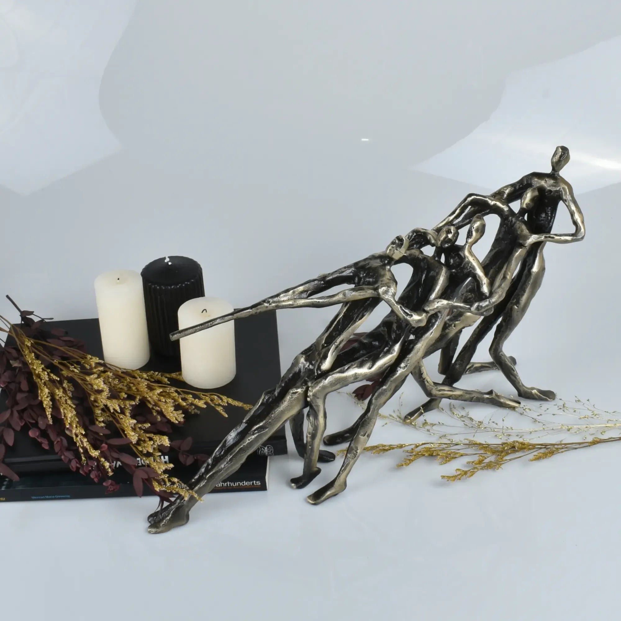 Skulptur - in Bronzeoptik - Metallskulptur Deko-Objekt Tauziehen Default Title